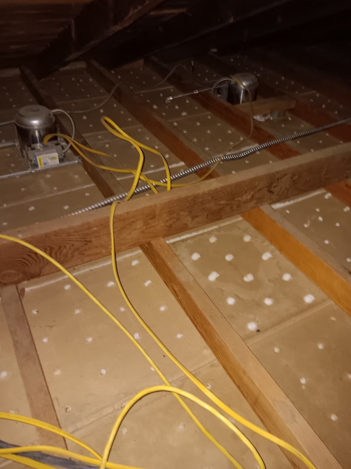 Attic insulation work by Santos AC and Insulation