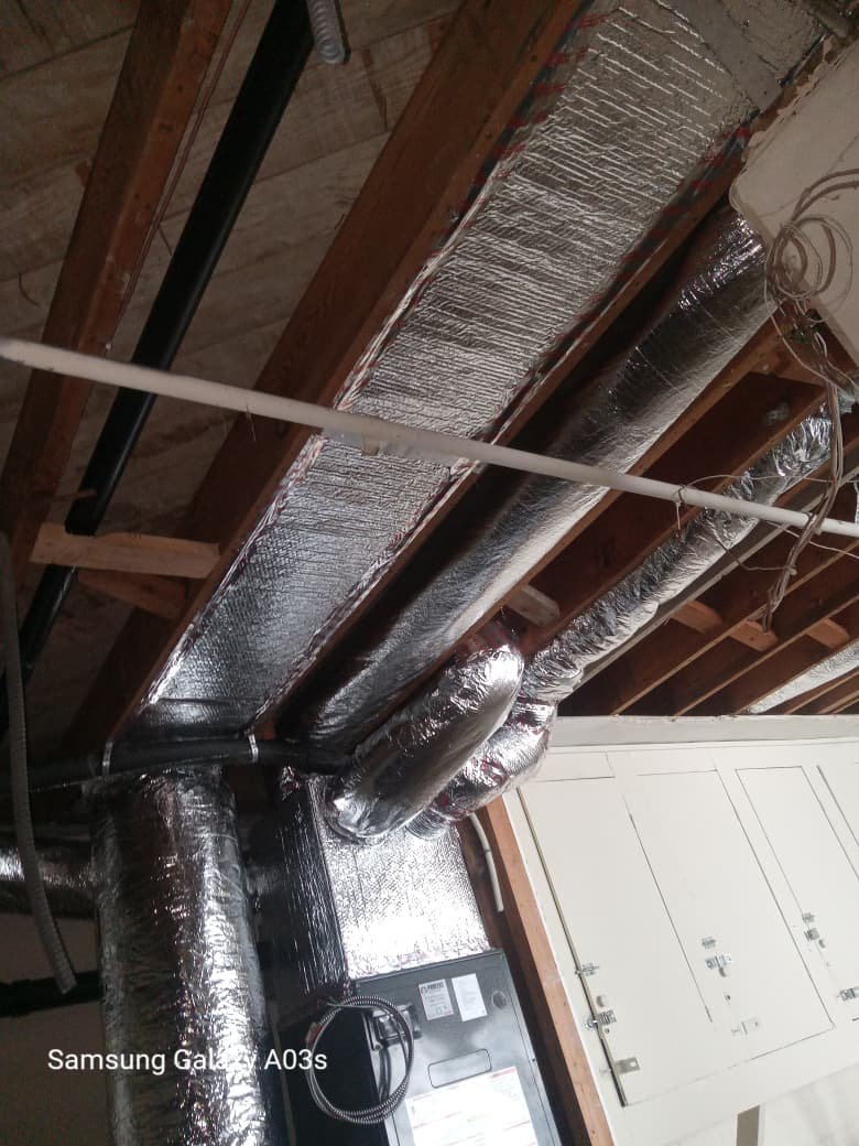 Air duct system inside a residential attic